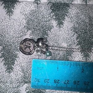 Silver Pendant Necklace with Charm